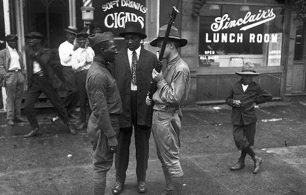  | In the Bronzeville neighborhood of Chicago a Black WWI veteran confronts a member of the white Illinois militia during the August 1919 Red Summer riots During the six days of violence 38 people died 23 Black and 15 white and more than 500 were injured | MR Online